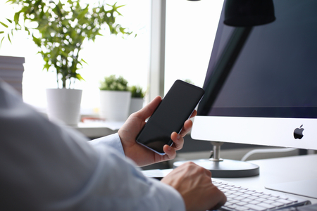 Apple imac in office table Illustrative editorialのeditorial素材