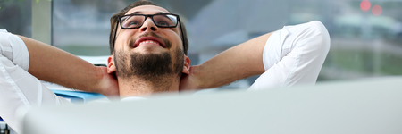 Handsome smiling bearded adult clerk person arms crossedの写真素材