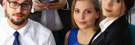 Group of modern businesspeople in officeの写真素材