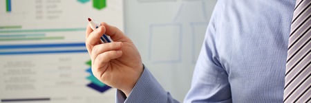 Male hand hold marker on white board problemの写真素材