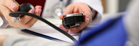 Female doctor arms make medic procedure closeupの写真素材