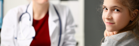 Little child at pediatrician receptionの写真素材