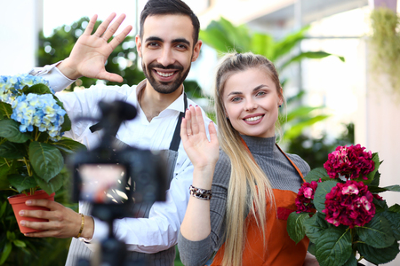 Young family say hallo subscribe to theの写真素材