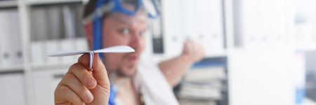 Man wearing suit and tie in goggles and snorkel