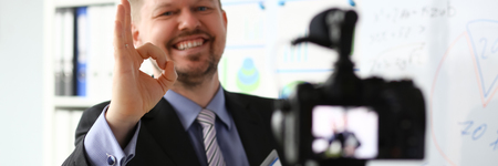 Male in suit and tie show confirm signの写真素材