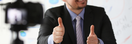 Male in suit and tie show confirm signの写真素材