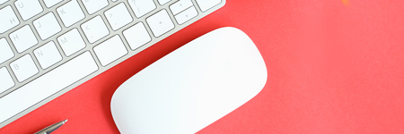 White keyboard with computer mouse and silver