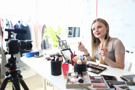 Young Blogger Recording Beauty Advice for Vlogの写真素材