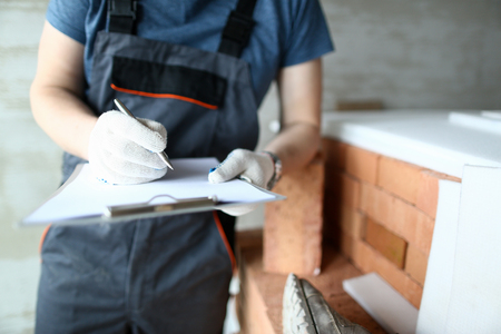 Male hands holding paper holderの写真素材