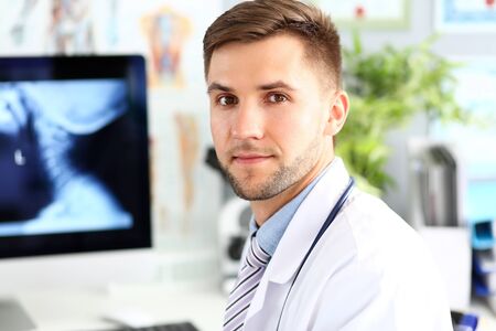 Doctor looking at camera