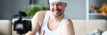 Male fitness blogger show thumb up