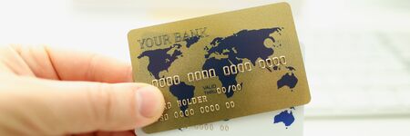 Male hand businessman hold white plastic cardの写真素材