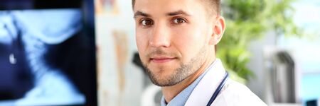 Doctor looking at camera