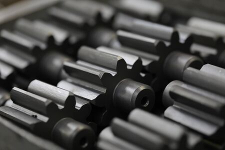 A lot of metal gears factory industry abstractの写真素材