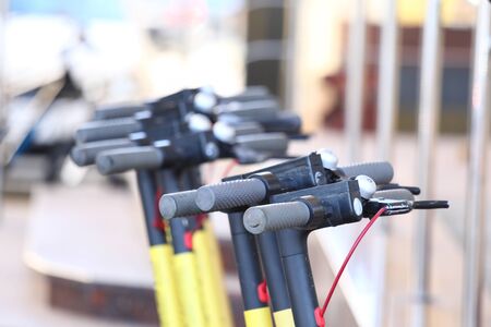 Several electrical scooters for publik rent service concept