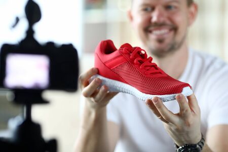 Male product reviewer tells his subscription in an online broadcast how to recognize signs of...