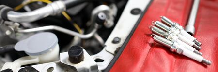 Focus on car details used for perfect auto functionality in modern engineering service station....
