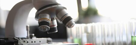 Focus on scope equipment and tools. Magnifying appliance in medical lab making and conducting experiments. Precision in results and researches. Medicine and healthcare conceptの写真素材