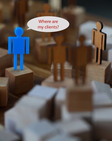 One blue man toy figure says where are my customers. Search for business partners concept.の写真素材