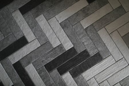 Close-up laid ceramic granite tiles for outdoor use. Technology of laying granite tiles....