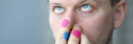 Man touches nose, on hands microbe of coronavirus. Patients condition worsens rapidly. Wash hands...