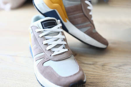 New sneakers standing on floor. Opening new shoe store concept
