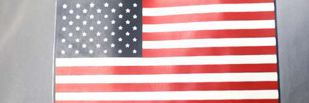 Minsk, Belarus - July 2 2020 :Flag USA patch on silver spacesuit closeup. Illustrative editorial.のeditorial素材