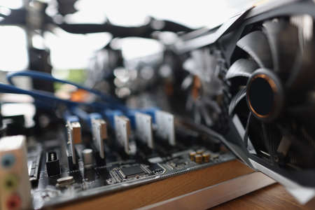 Set of riser installed at pci express slots of cryptocurrency mining farm closeupの写真素材