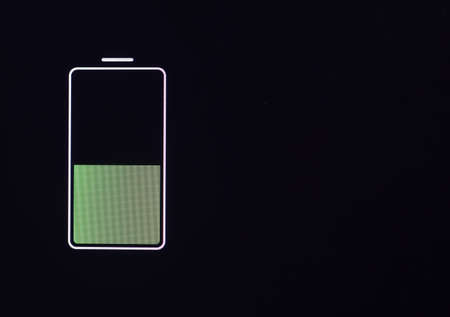 Battery level on the portable device. Mobile phone charging service and service in public places conceptの写真素材