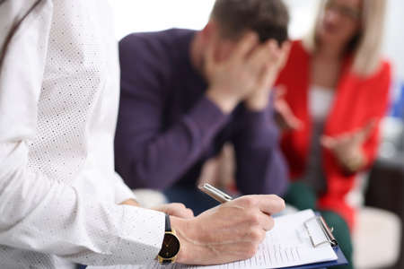 Married couple at psychologists appointment. Specialist help for married couples in divorce concept