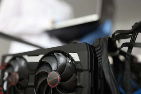 Graphics card in engineering mining farm closeup background. Mining cryptocurrency conceptの写真素材