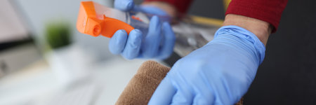 Female hands in gloves wipe the dust. Services of cleaning companies conceptの写真素材