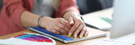 Business woman in office sits at table. Manager workflow consulting concept
