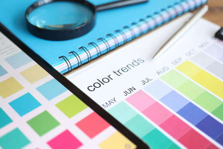 Palette with color trends by month lying on table closeupの写真素材