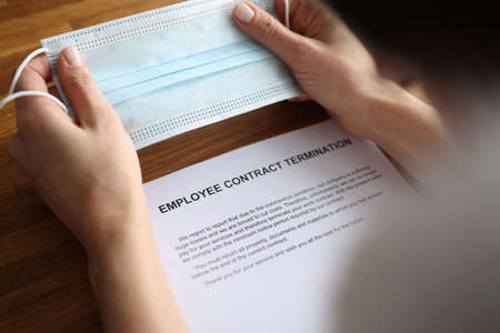 Employee received contract termination notice in coronavirus pandemicの写真素材