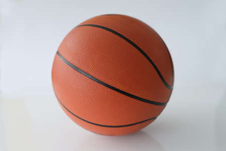 Closeup of basketball rubber ball on white background