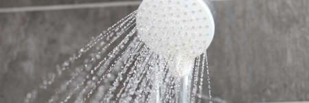 Shower mixer from which water flows into bathroom