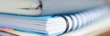 Diary and notebook and documents are on table