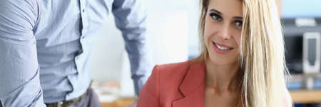 Businesswoman puts electronic signature on tablet closeupの写真素材