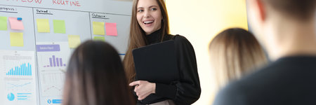 Training coach conducts business training for employees