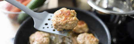 Minced meat in form of cutlets is fried in panの写真素材