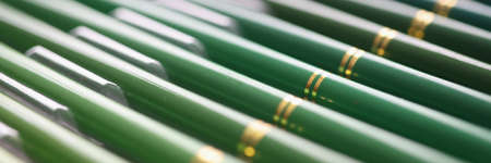 Set of green wooden pencils in different shades closeupの写真素材