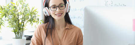 Confident female mentor will enter recording of math presentationの写真素材