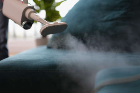 Steam vacuum cleaner for cleaning fabric furniture closeupの写真素材