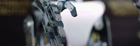 Robot stretching out metal hand for handshake closeup