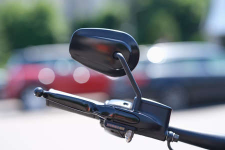 Steering wheel and part of braking system from motorcycle with mirrorの写真素材