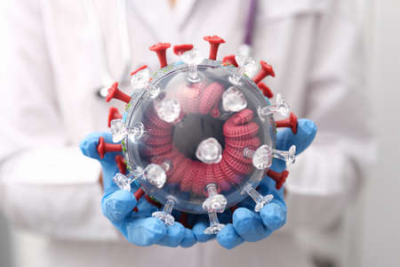 The doctor holds of the coronavirus, the mutation covid-19の写真素材