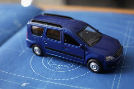 New car model development, miniature automobile model on blueprint paperの写真素材