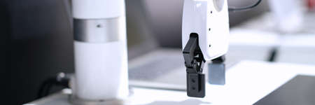 Mechanical white arm of robot manipulator closeup