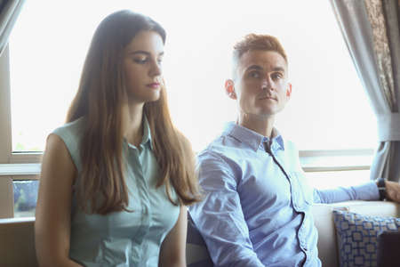 Female and male sitting in cafe on business meeting, business partners or colleaguesの写真素材